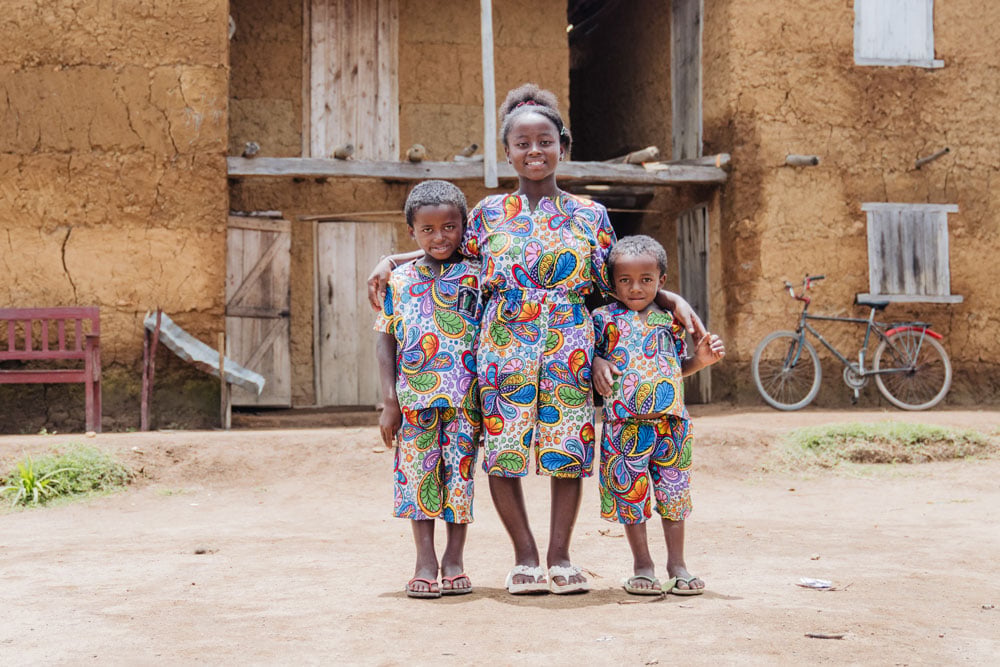 Three siblings stand tall after orthopedic surgery.