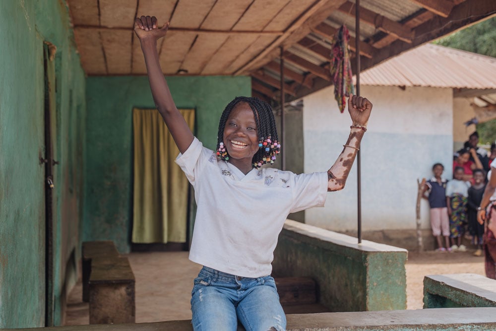 Jaminatu's grin says it all, hope and healing has changed her life!